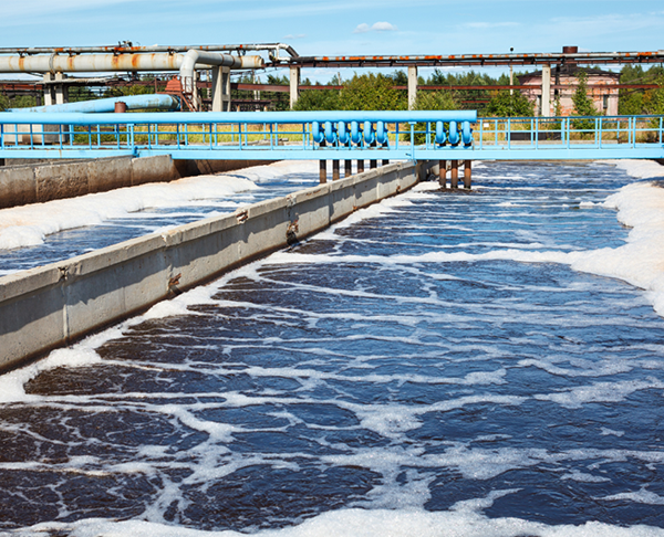 Water treatment plant with foamy aeration tanks.