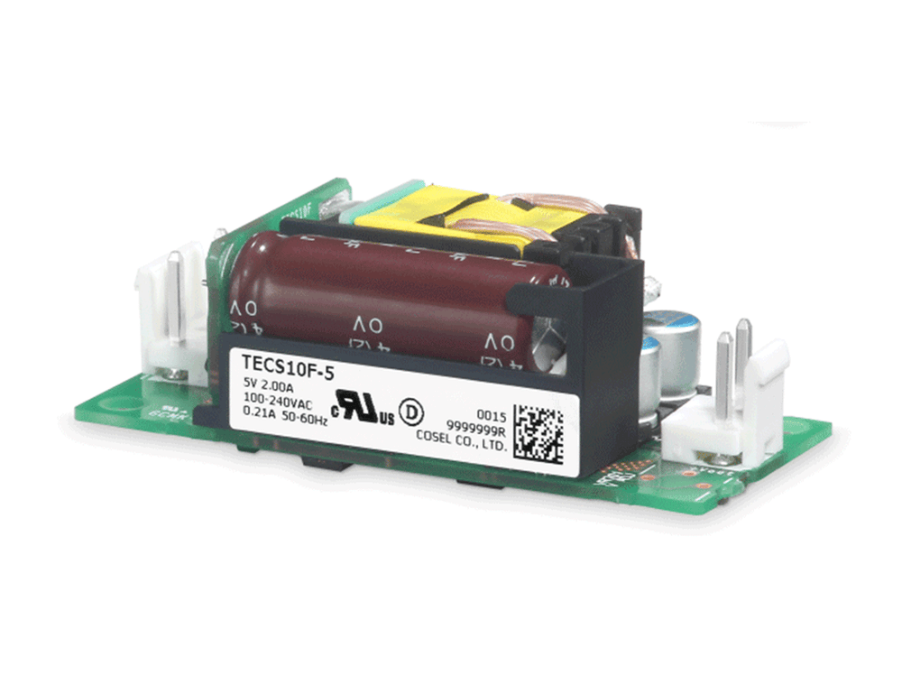 Cosel TECS10F-5 open-frame AC-DC power supply, 10W 5V output, compact PCB module with brown filter capacitor.